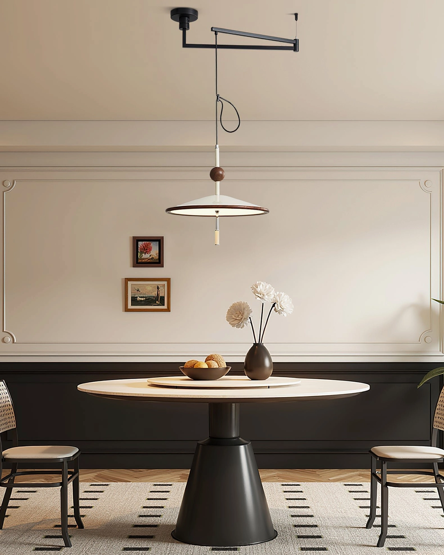 Remy swing arm pendant light installed in French retro dining room setting above round black dining table with vintage charm and warm illumination