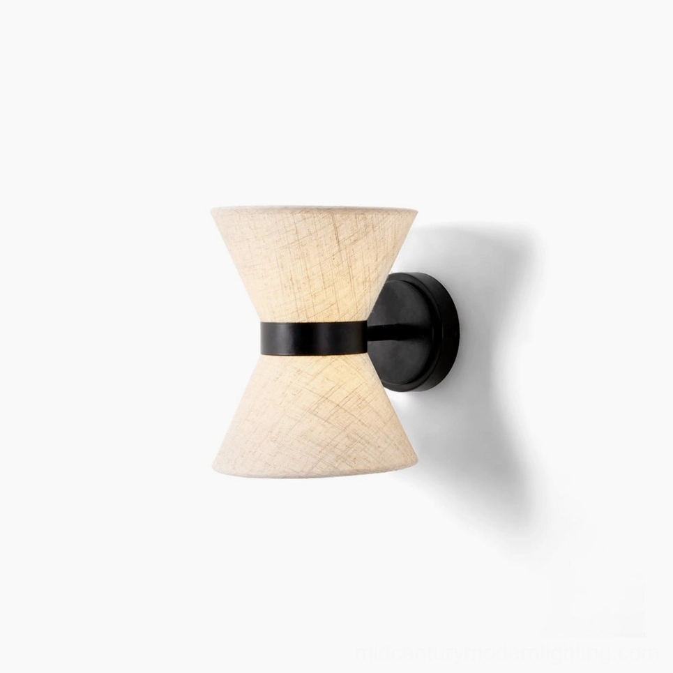 Renwick hourglass wall sconce with beige linen shade and matte black metal frame, front view on white background