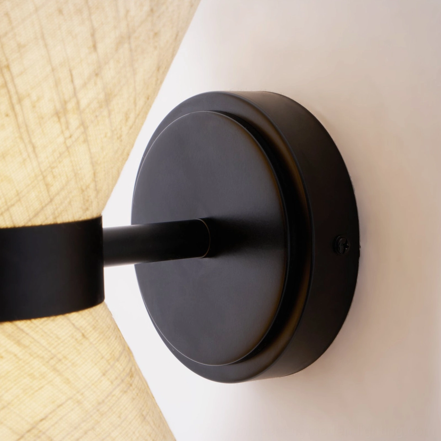 Renwick hourglass wall sconce in minimalist interior with clean lines and neutral palette