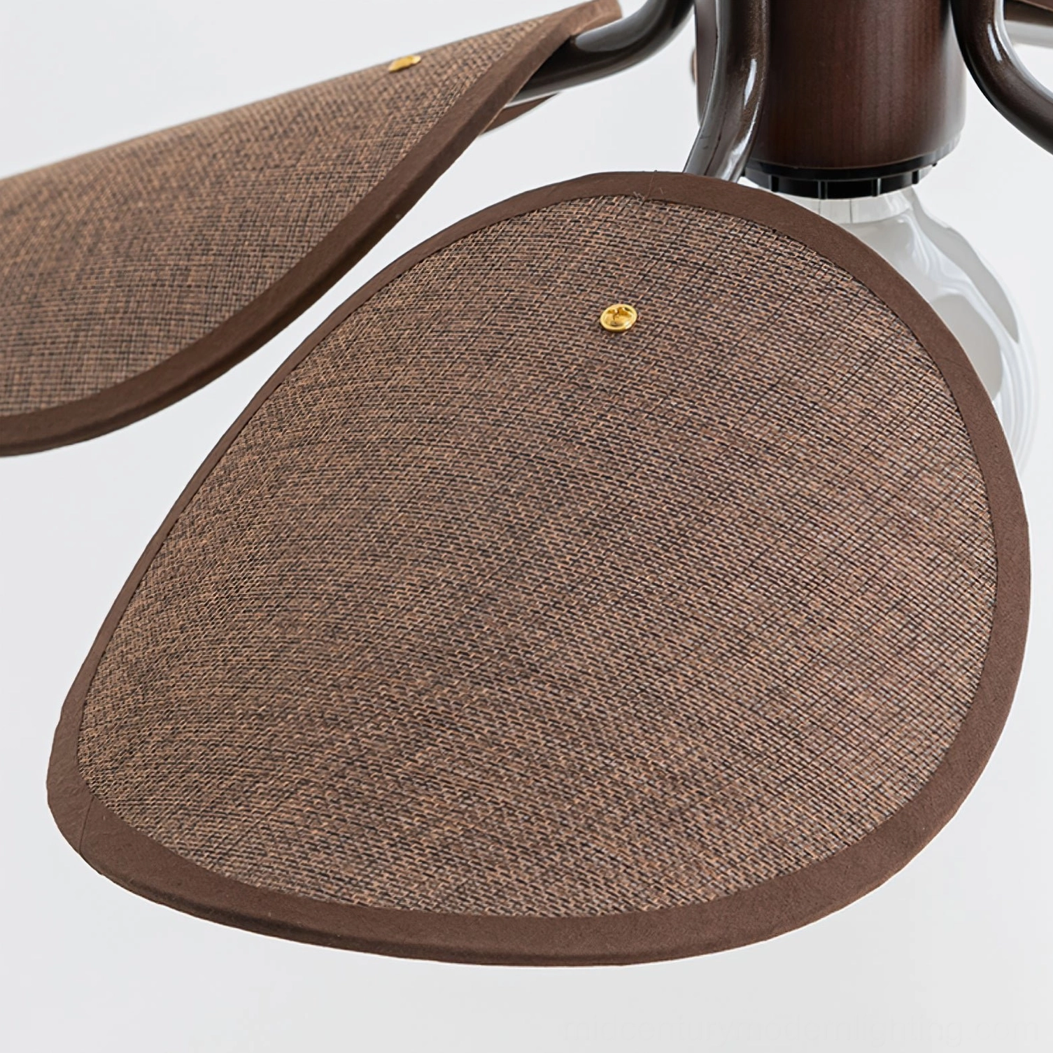 Riankh pendant lamp shade component close-up showing detailed woven fabric texture, brown border and metal fixing button