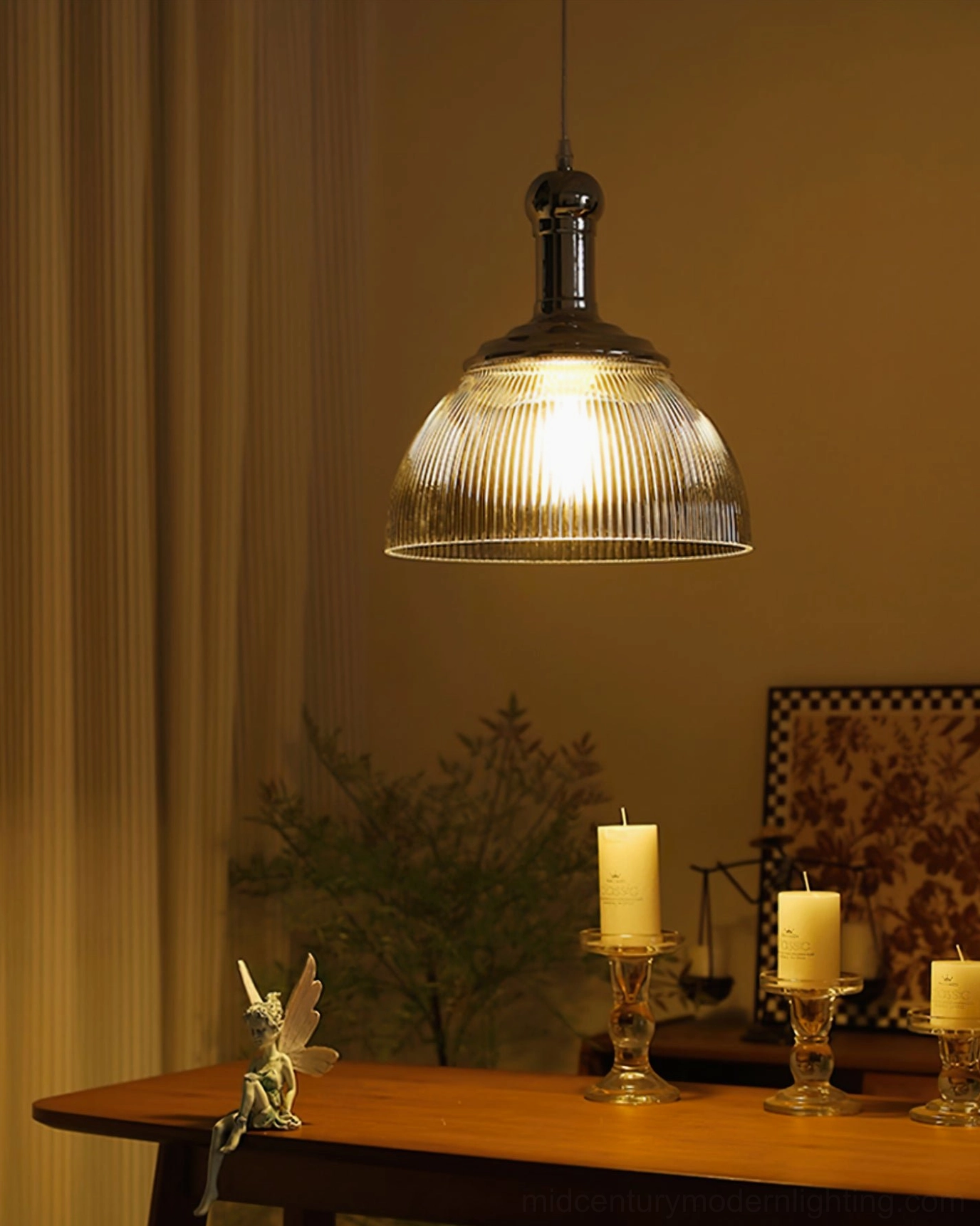 Ribbed chrome pendant lamp demonstrating versatile mid-century modern design for kitchen and dining areas