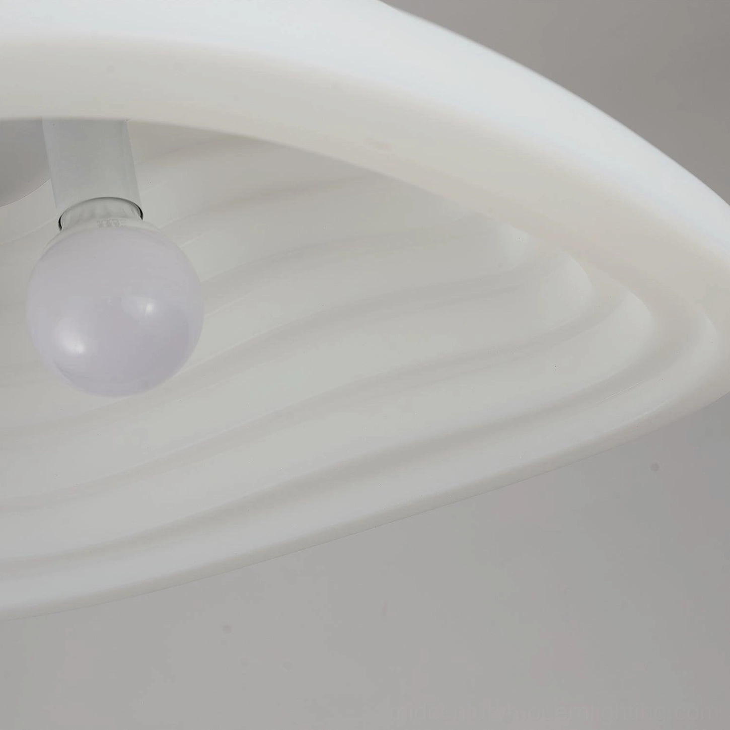 Close-up detail of Rice Field Acoustic Pendant - matte white ribbed plastic shade texture and E26/E27 bulb socket