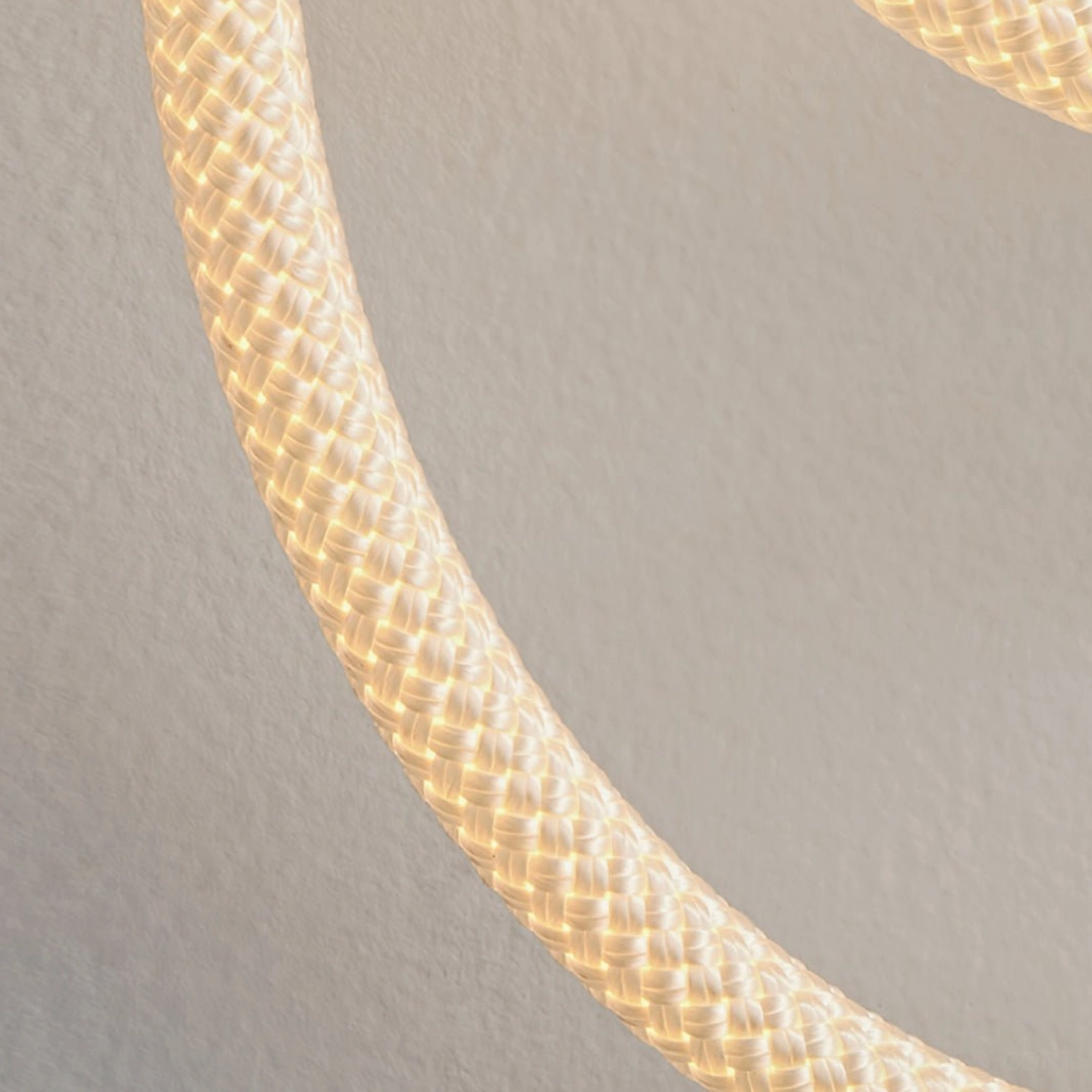 Rigel sculptural rope wall lamp artistic design with brushed gold or white metal mount