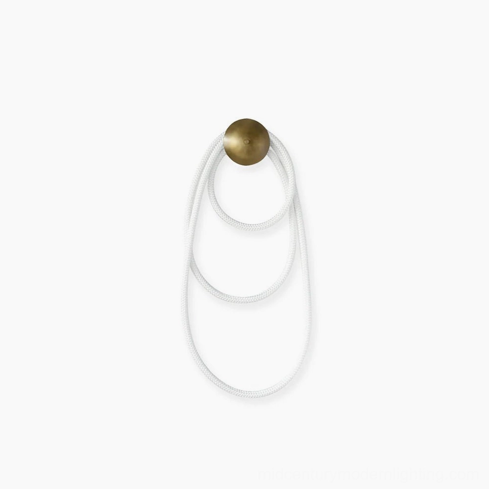 Rigel sculptural wall lamp with double-loop rope design on white background overhead view