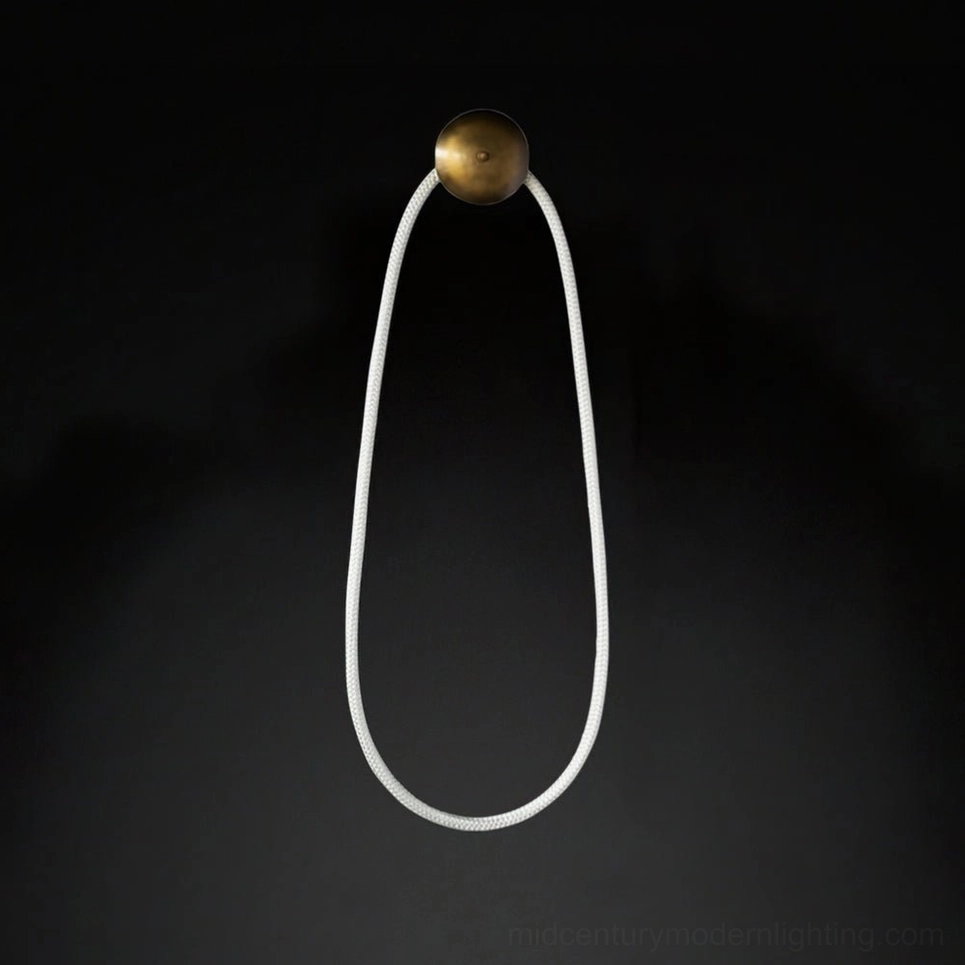 Rigel sculptural wall lamp gold finish model in elegant modern bedroom or living space