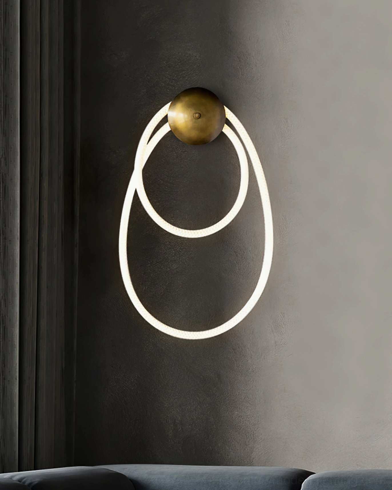 Rigel sculptural wall lamp with illuminated rope coil creating artistic shadow patterns