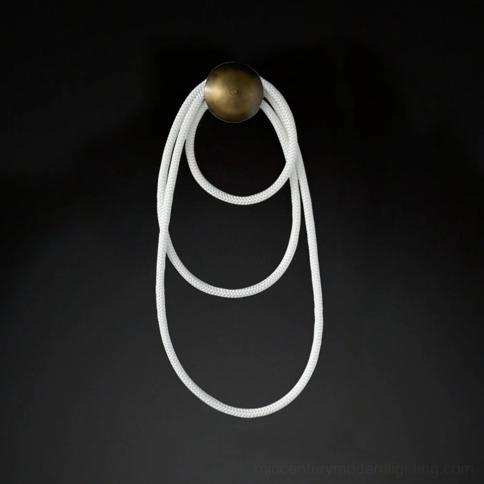 Rigel modern wall light fixture detail shot of rope weave pattern and light diffusion