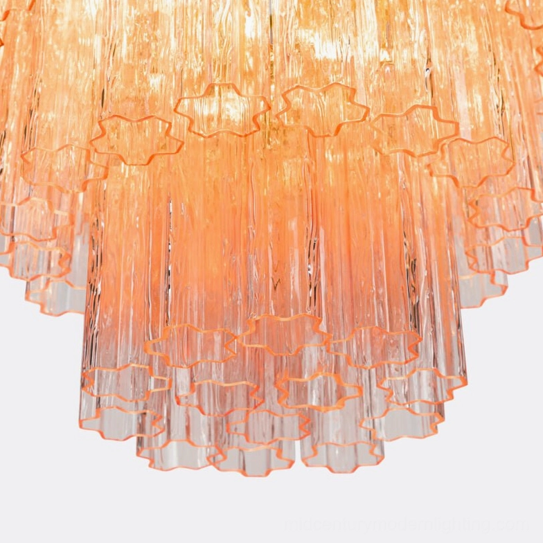 Rina Firenze chandelier light transmission through layered glass creating ambient shadow patterns
