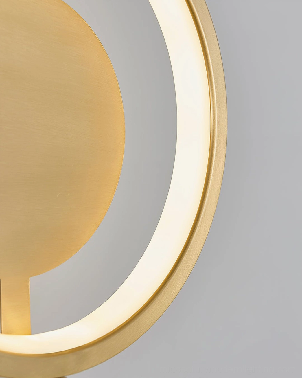 Contemporary wall surface with modern ring LED lamp showing light diffusion and glow effect