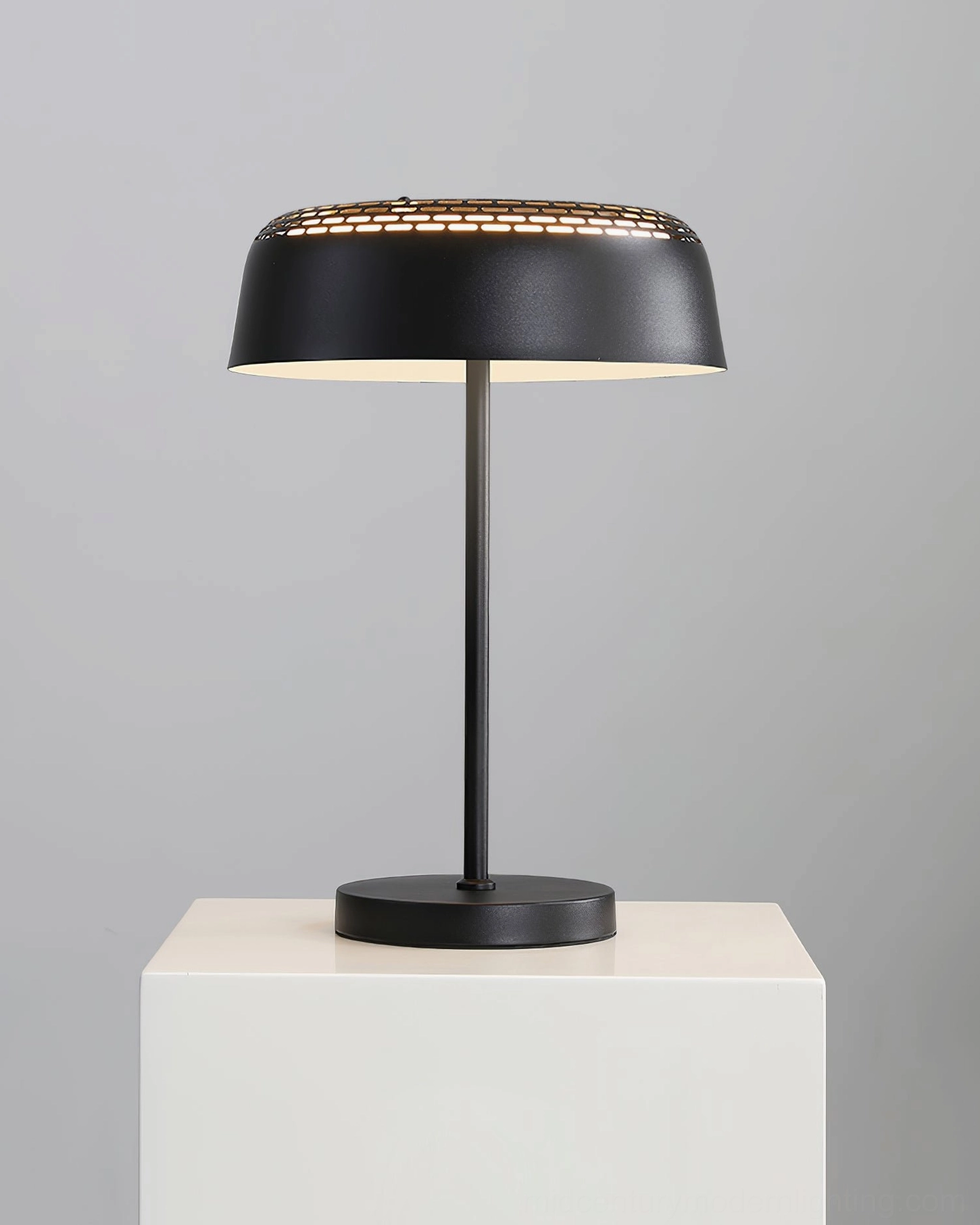 Ring T1 modern desk table lamp with minimalist metal construction and perforated design