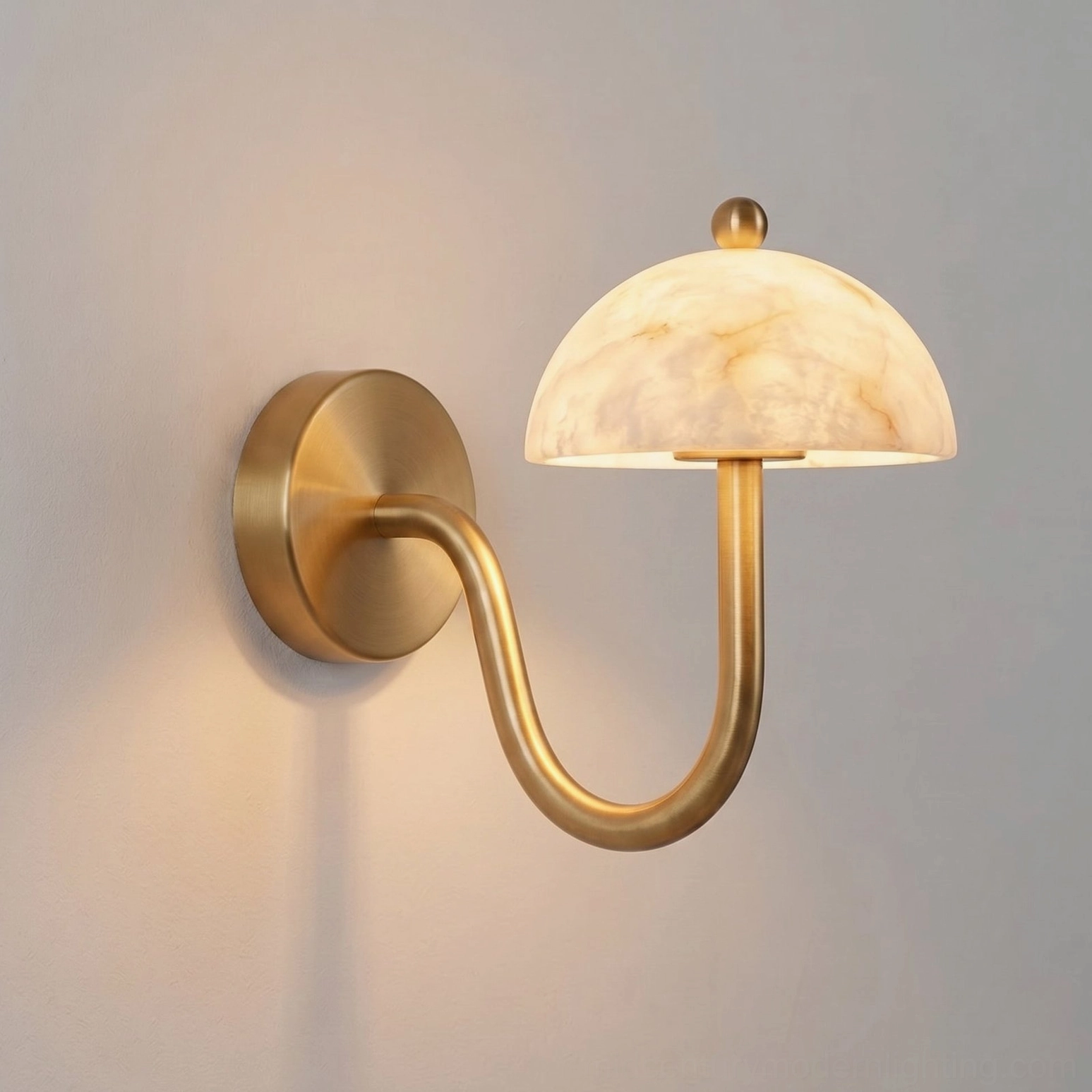 Close-up detail of Ripple sconce showing natural alabaster stone texture, brass hardware, and polished finish