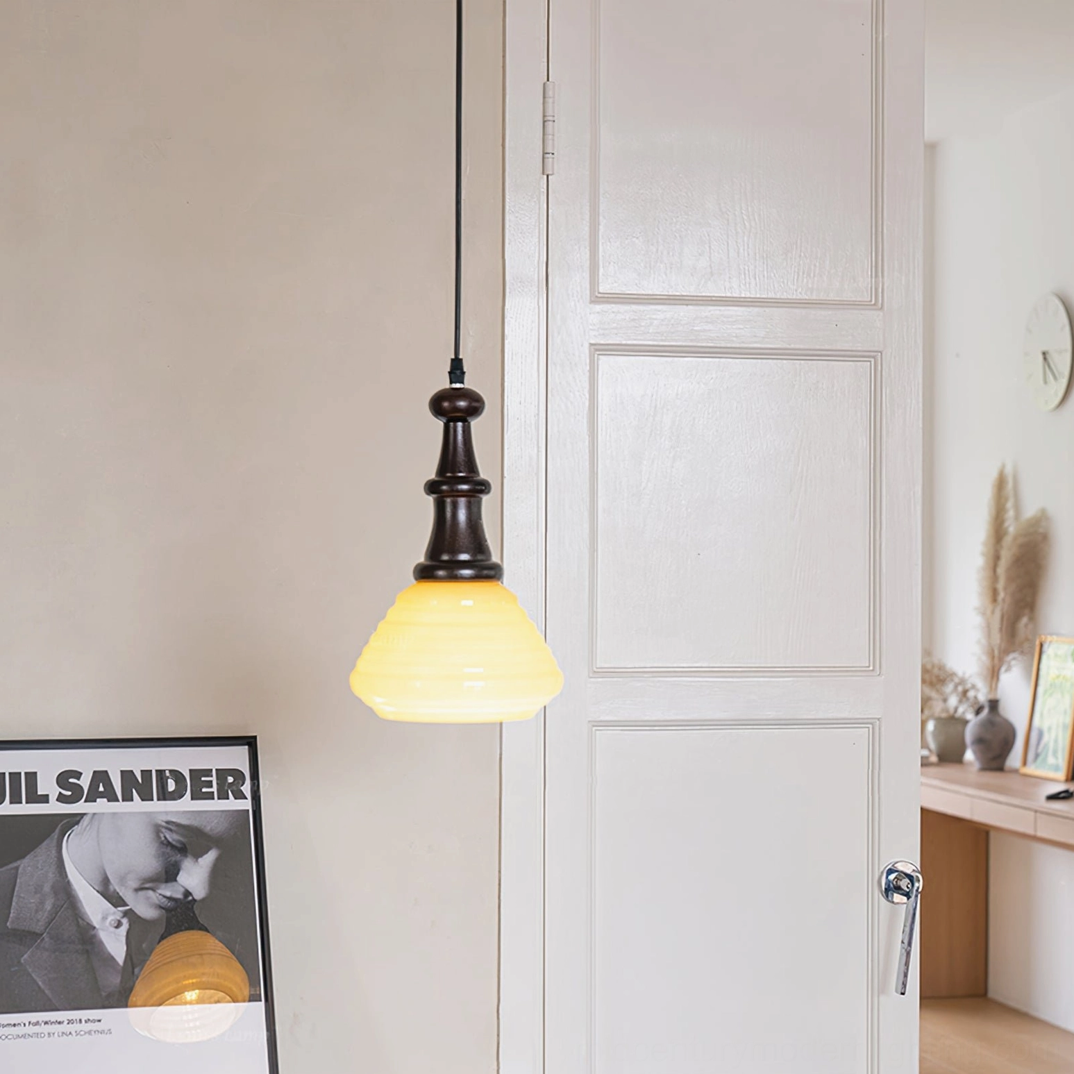 Retro style pendant light glowing in minimalist vanity corner with soft warm ambient lighting and low side perspective