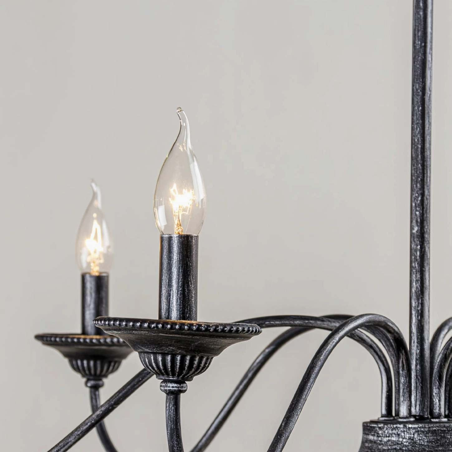 Rohan chandelier candle socket and bulb fixture details close-up textured black candle trays fluted metal posts