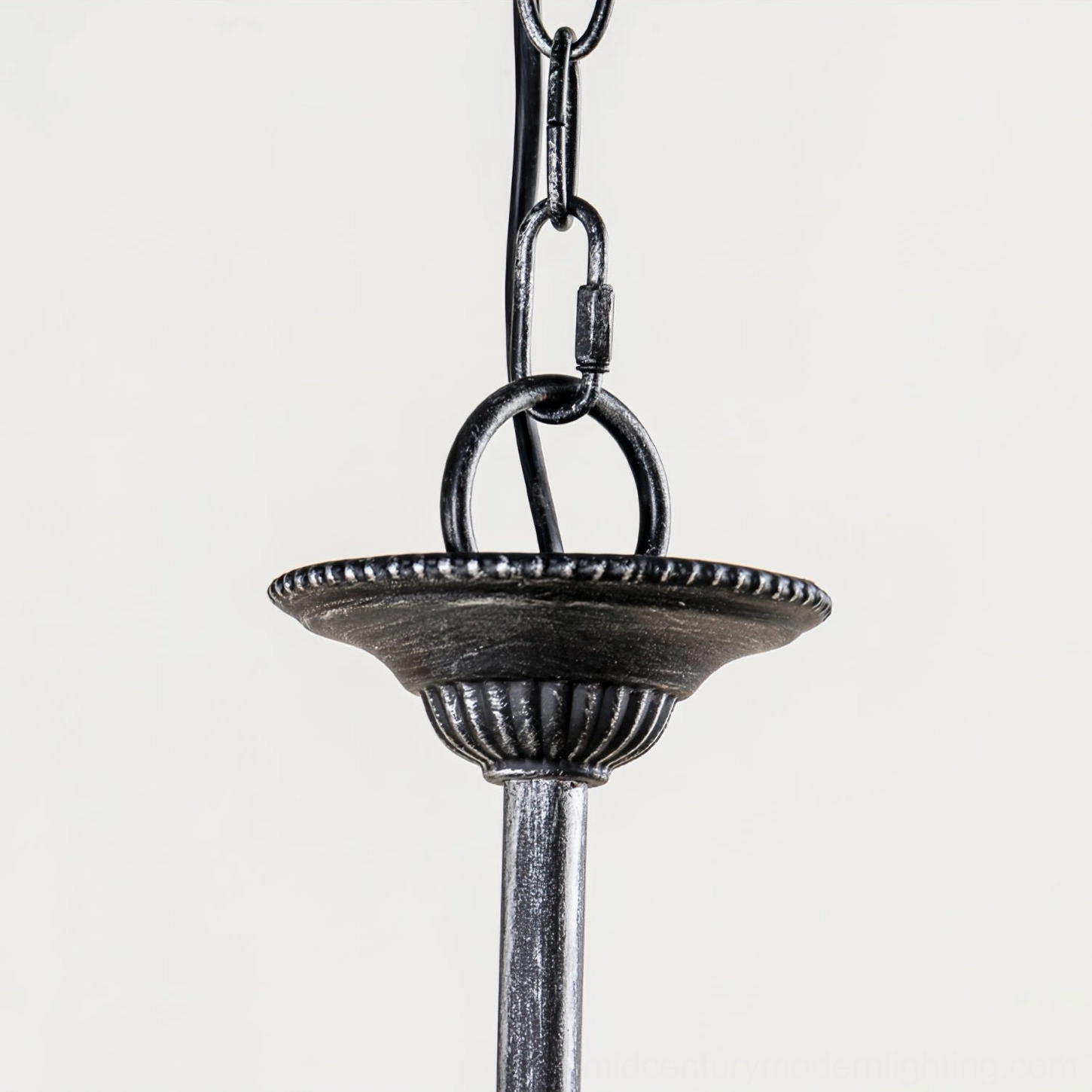 Rohan chandelier hanging hardware and chain system close-up showing linked metal suspension and ceiling mount plate