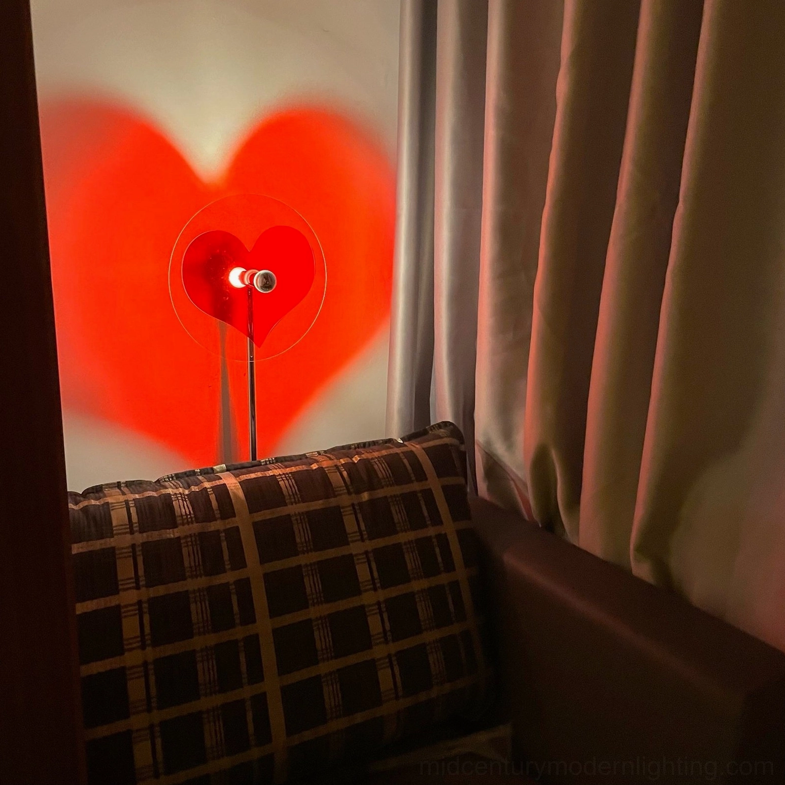 Heart projection floor lamp displaying romantic lighting solution for contemporary home interiors
