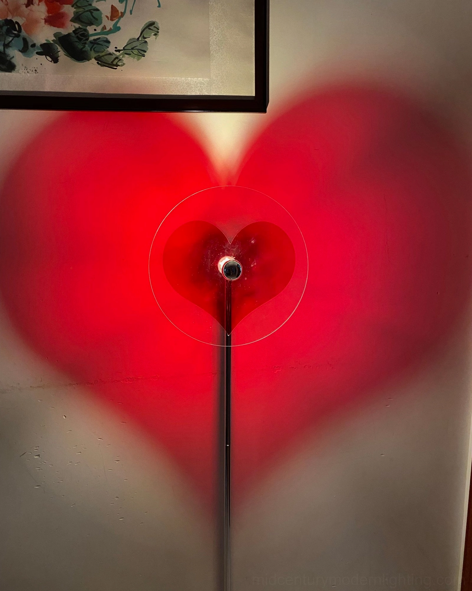 Heart-shaped shadow floor lamp displaying romantic aesthetic perfect for modern home interiors