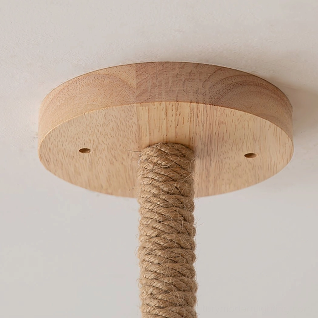 Top-down view of wooden ceiling plate with rope-wrapped suspension rod for chandelier installation