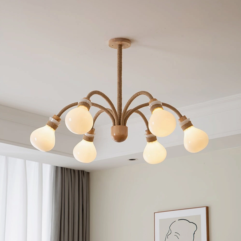 Overhead view of 6-head wooden jute chandelier with glowing frosted bulbs installed in minimalist beige living room