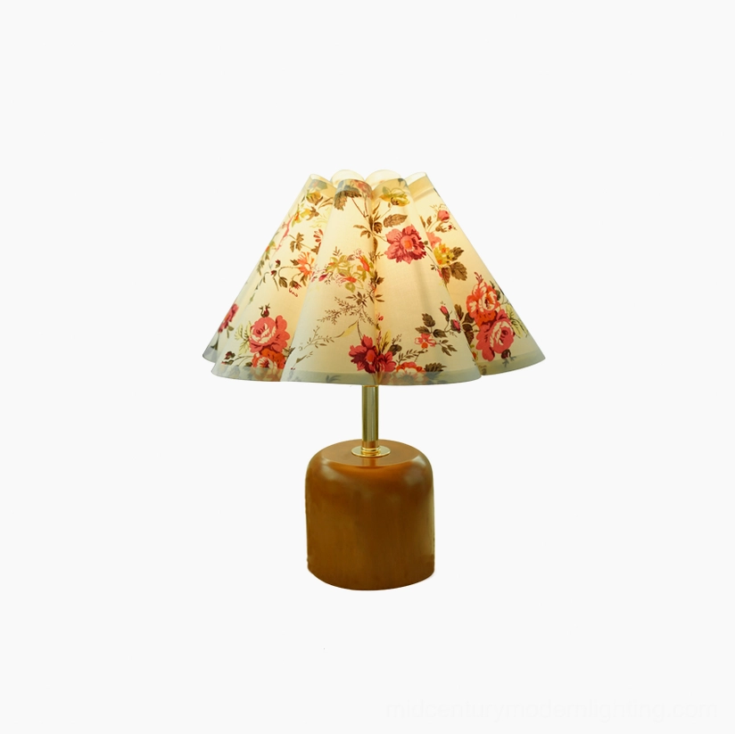 Retro floral table lamp showing complete profile with pleated shade and walnut base construction