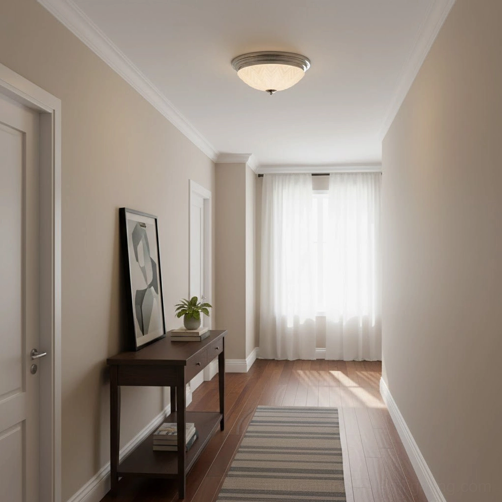Round flush ceiling lamp in residential entryway hallway with wooden console table and striped area rug