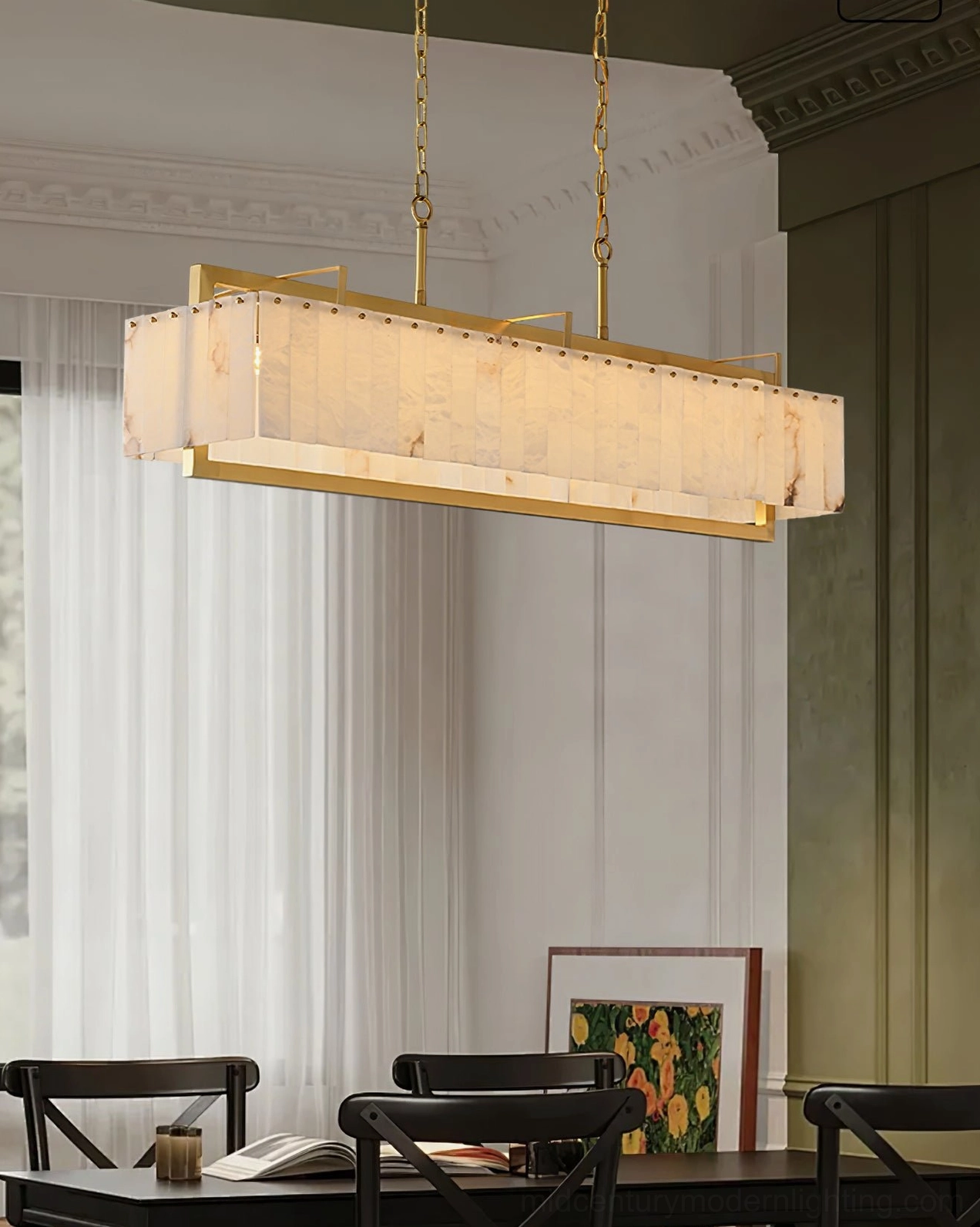 Ruben Alabaster Chandelier low side-angle view in cozy minimalist home dining nook with dark wood furniture