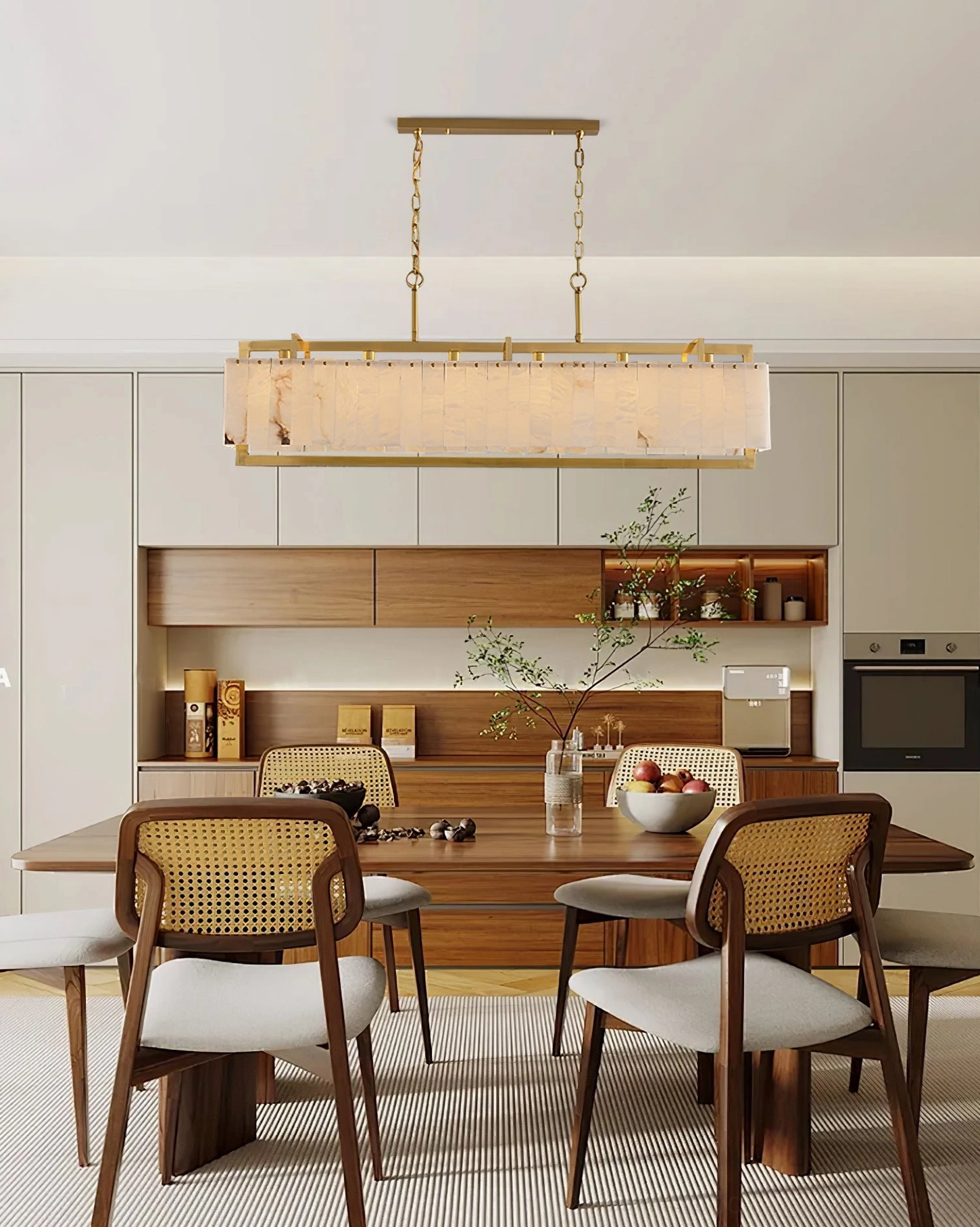 Ruben Alabaster Chandelier installed in modern open-plan kitchen dining area with warm neutral decor
