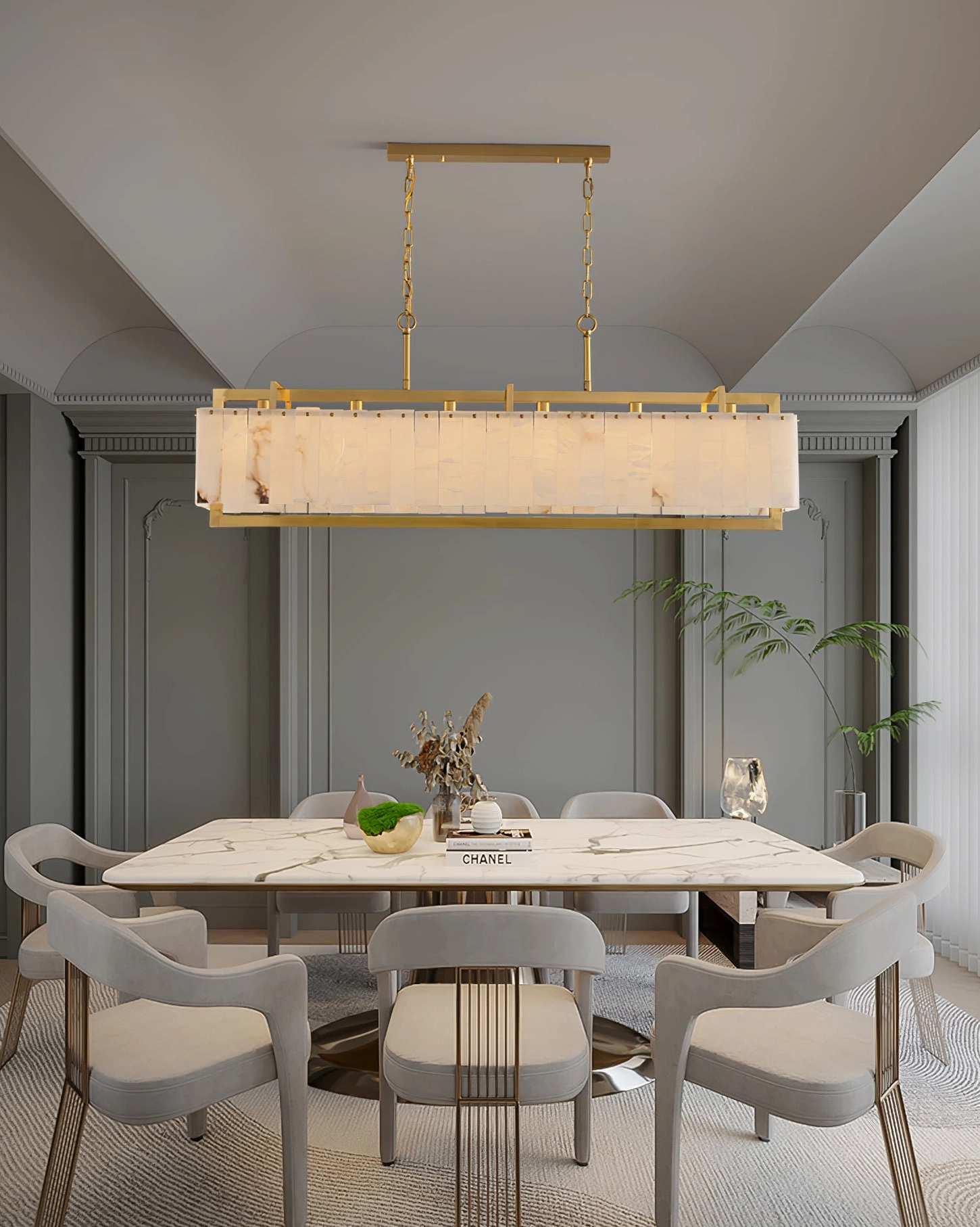 Ruben Alabaster Chandelier in elegant dining space with upholstered gray chairs - minimalist luxury interior