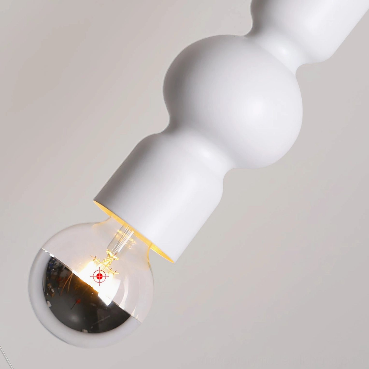 Rudd black matte cylindrical pendant light geometric form studio product photograph