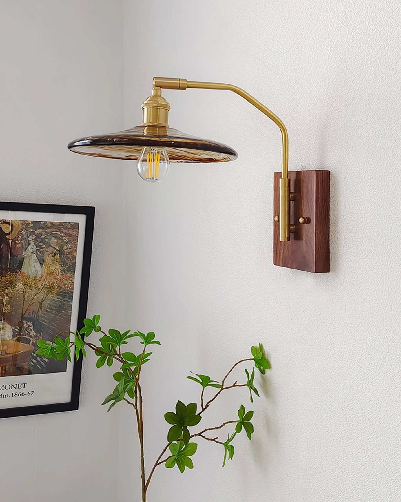 Runia retro wall lamp side view with exposed filament bulb creating warm ambient lighting in minimalist living space