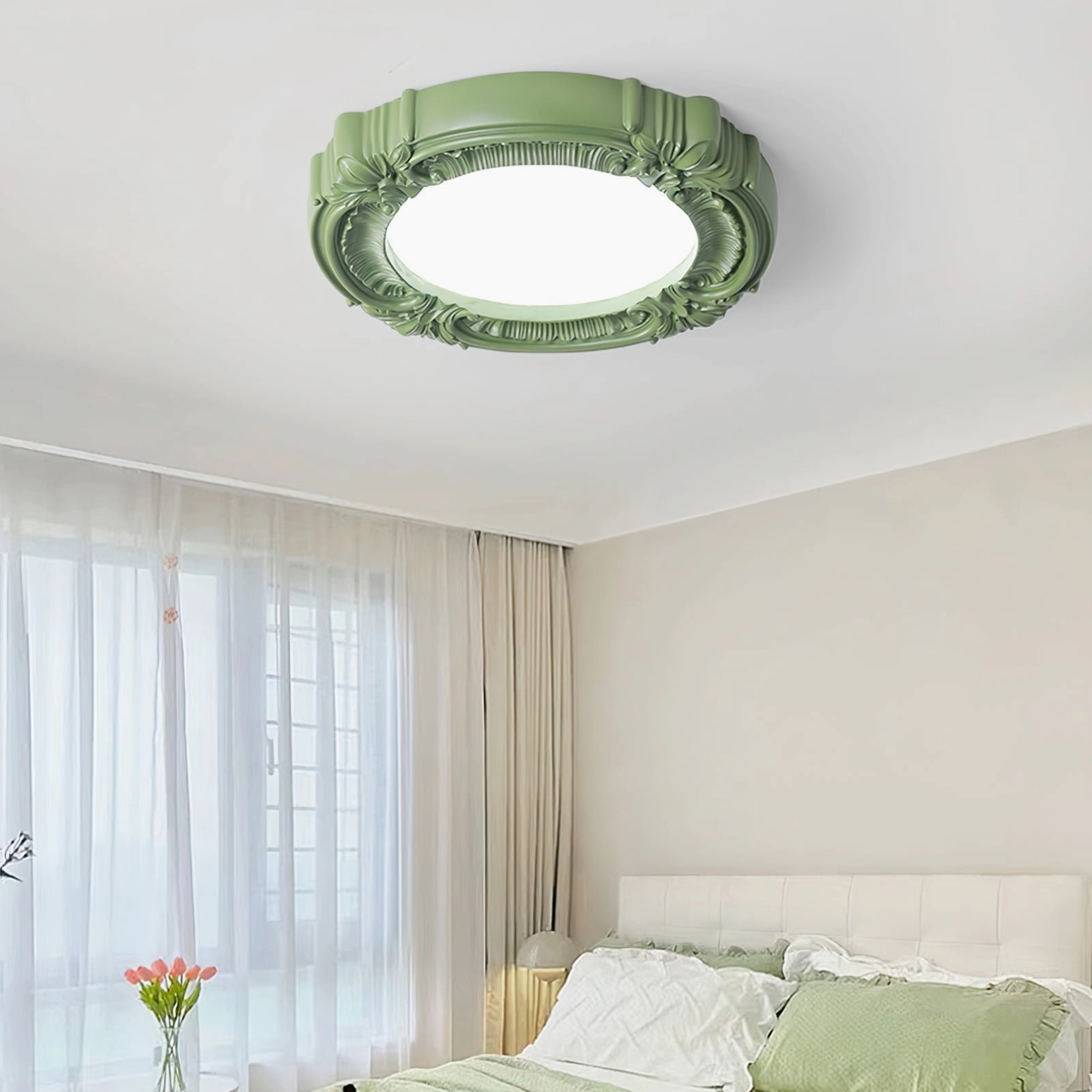 Sage green carved retro ceiling lamp flat lay view with white bed and green bedding background