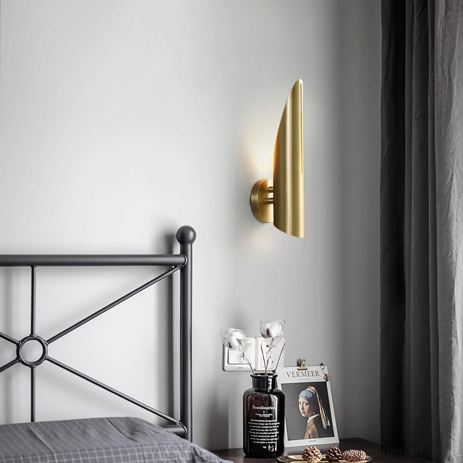 Salvatore brass wall sconce warm finish mid-century modern aesthetic interior lighting