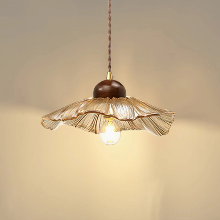 Scalloped floral pendant lamp front close-up view amber glass shade fluted details
