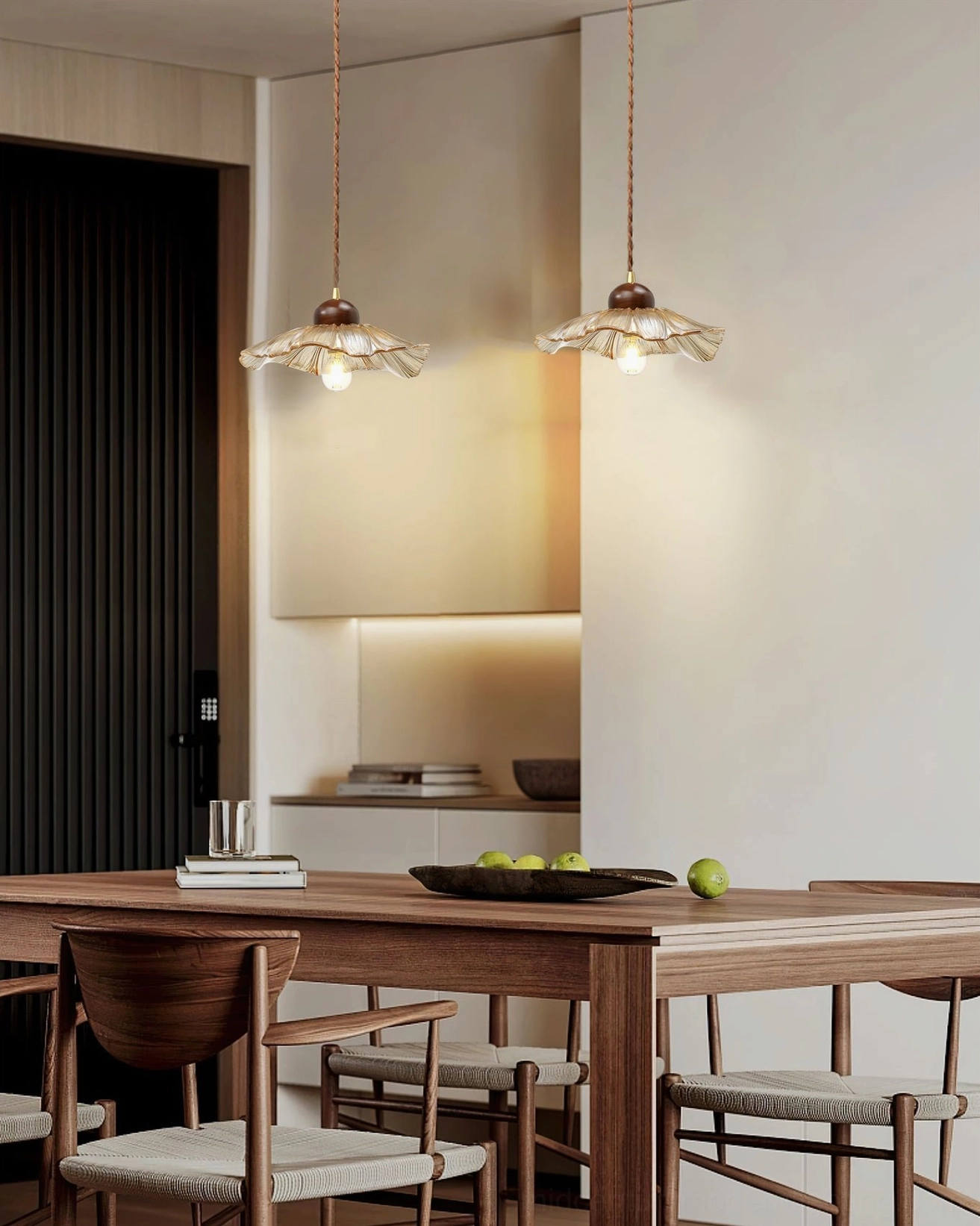 Two scalloped pendant lamps in modern dining kitchen space contemporary interior