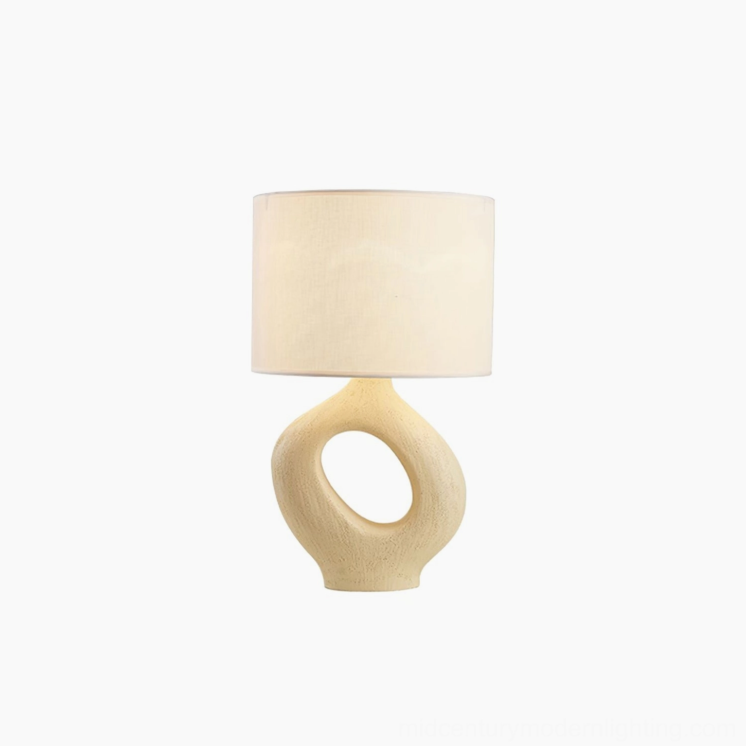 Sauce sculptural resin table lamp establishing atmospheric lighting in contemporary minimalist interior design