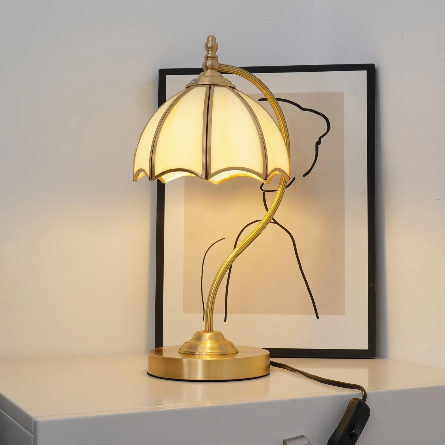 Sculptural umbrella table lamp demonstrating geometric mid-century modern design silhouette
