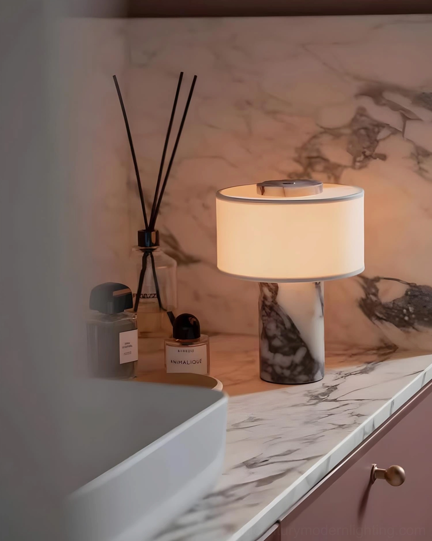 Sediment marble table lamp paired with contemporary home accessories on console surface