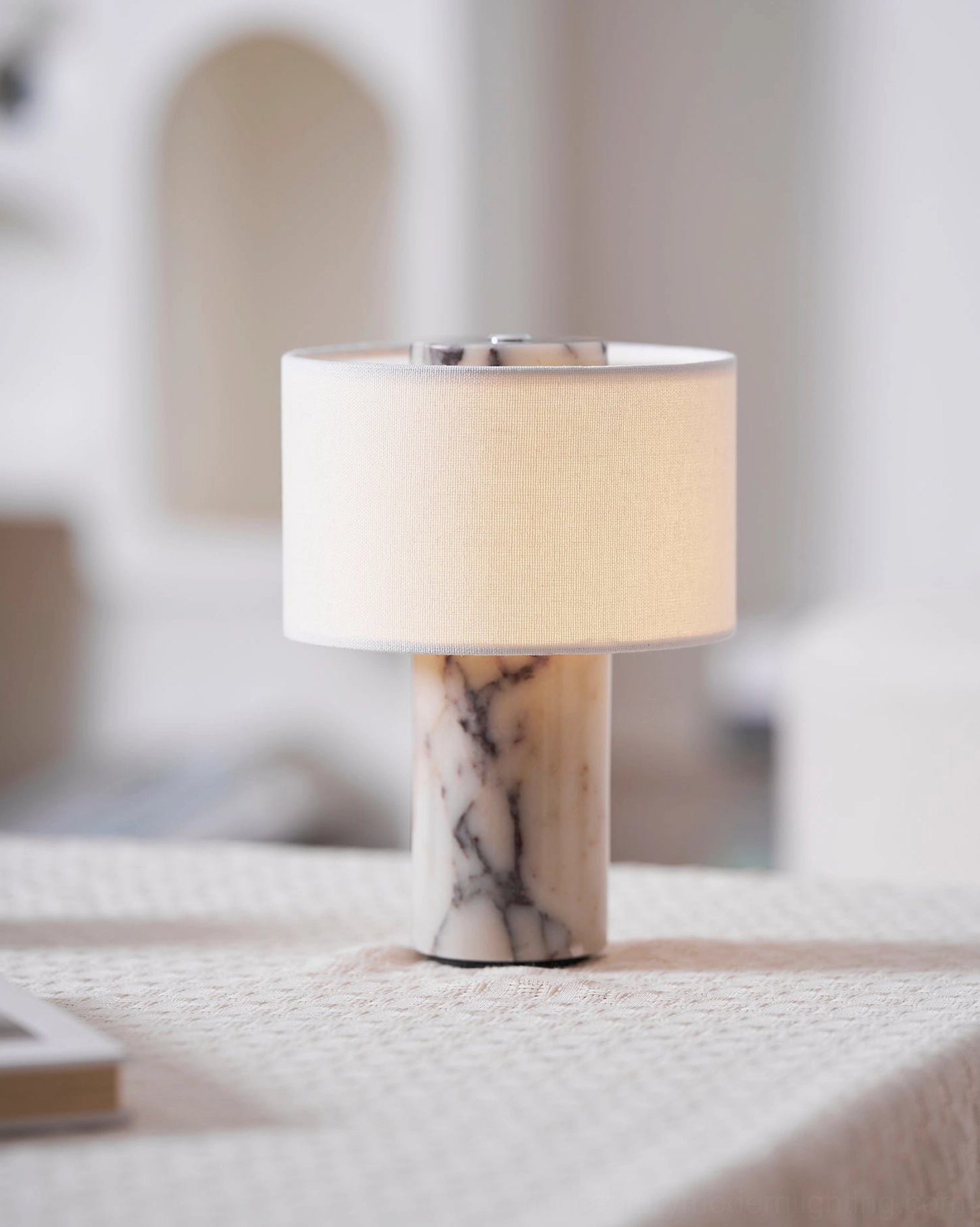Sediment cordless marble lamp repositioned on dining table as portable accent lighting