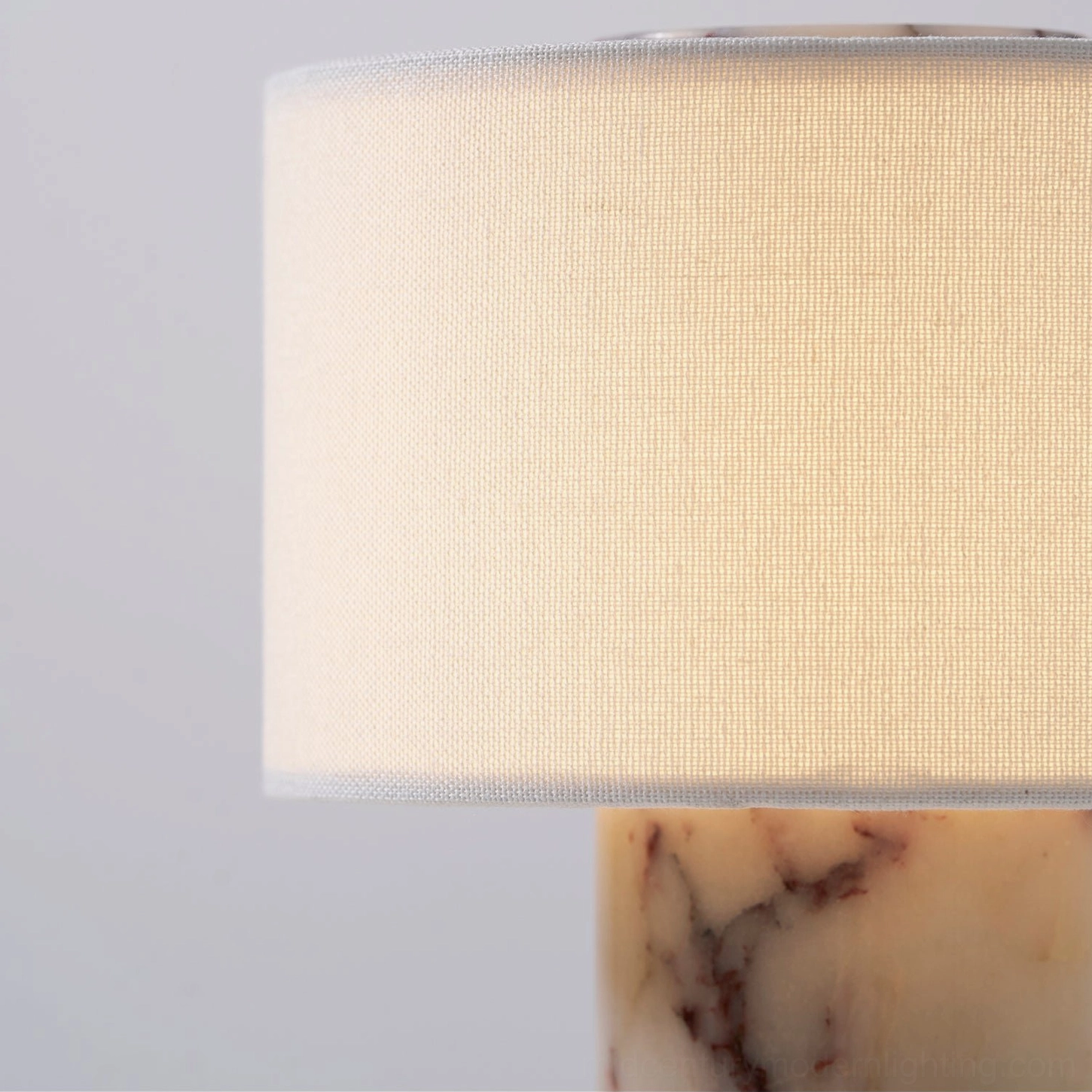 Sediment marble table lamp with linen shade and marble finial cap, architectural design detail