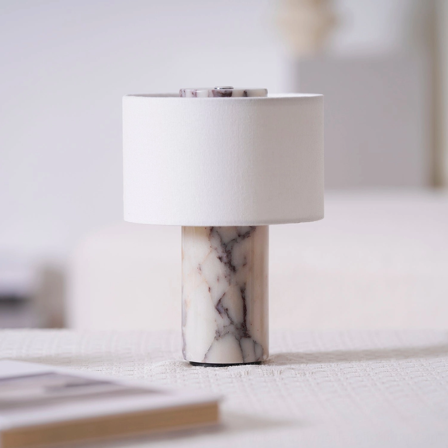 Three Sediment marble lamp variants showcasing Beige, White, and Bulgari Red stone options