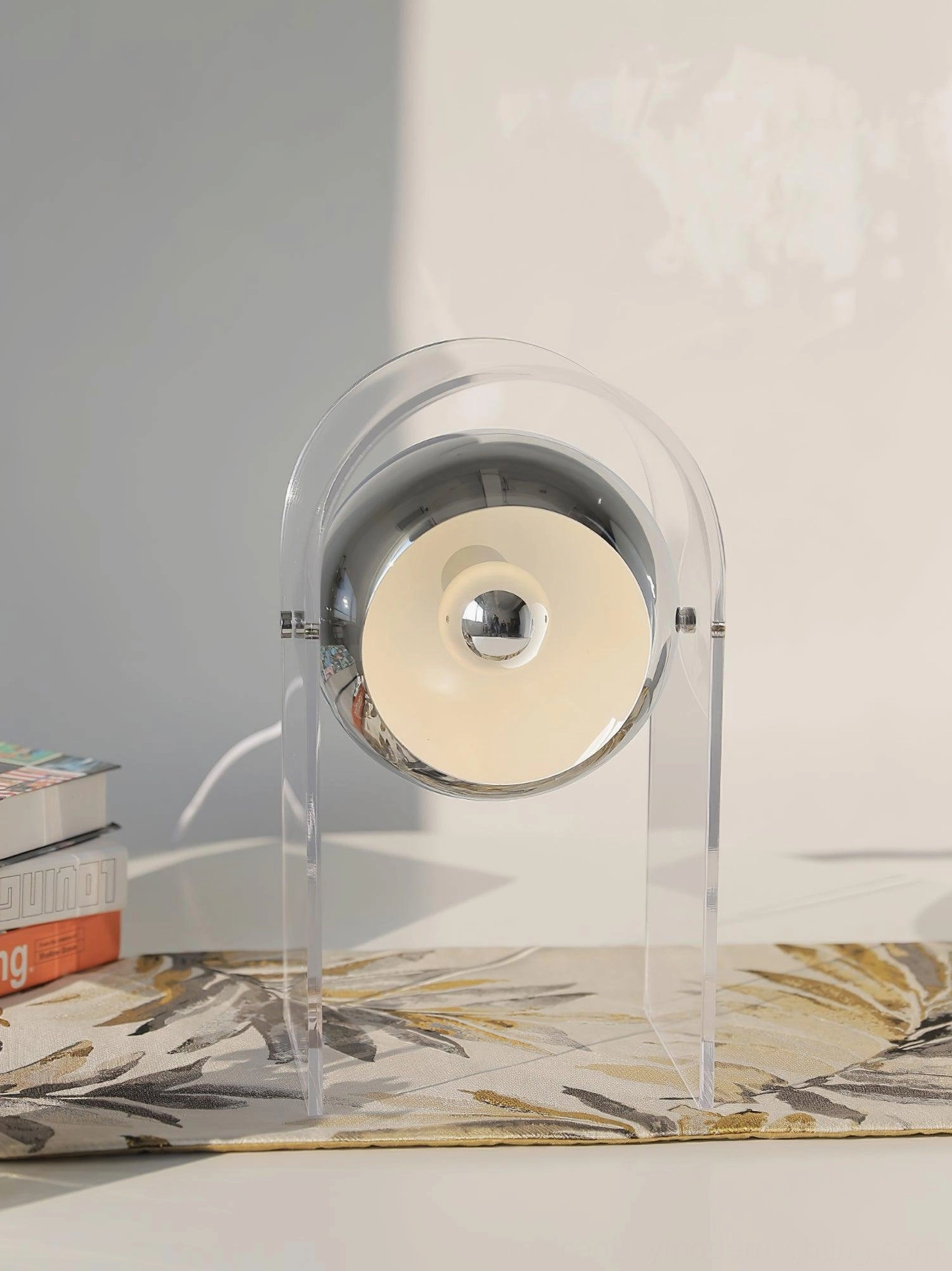 Contemporary touch-activated desk lamp with premium materials and minimalist form factor