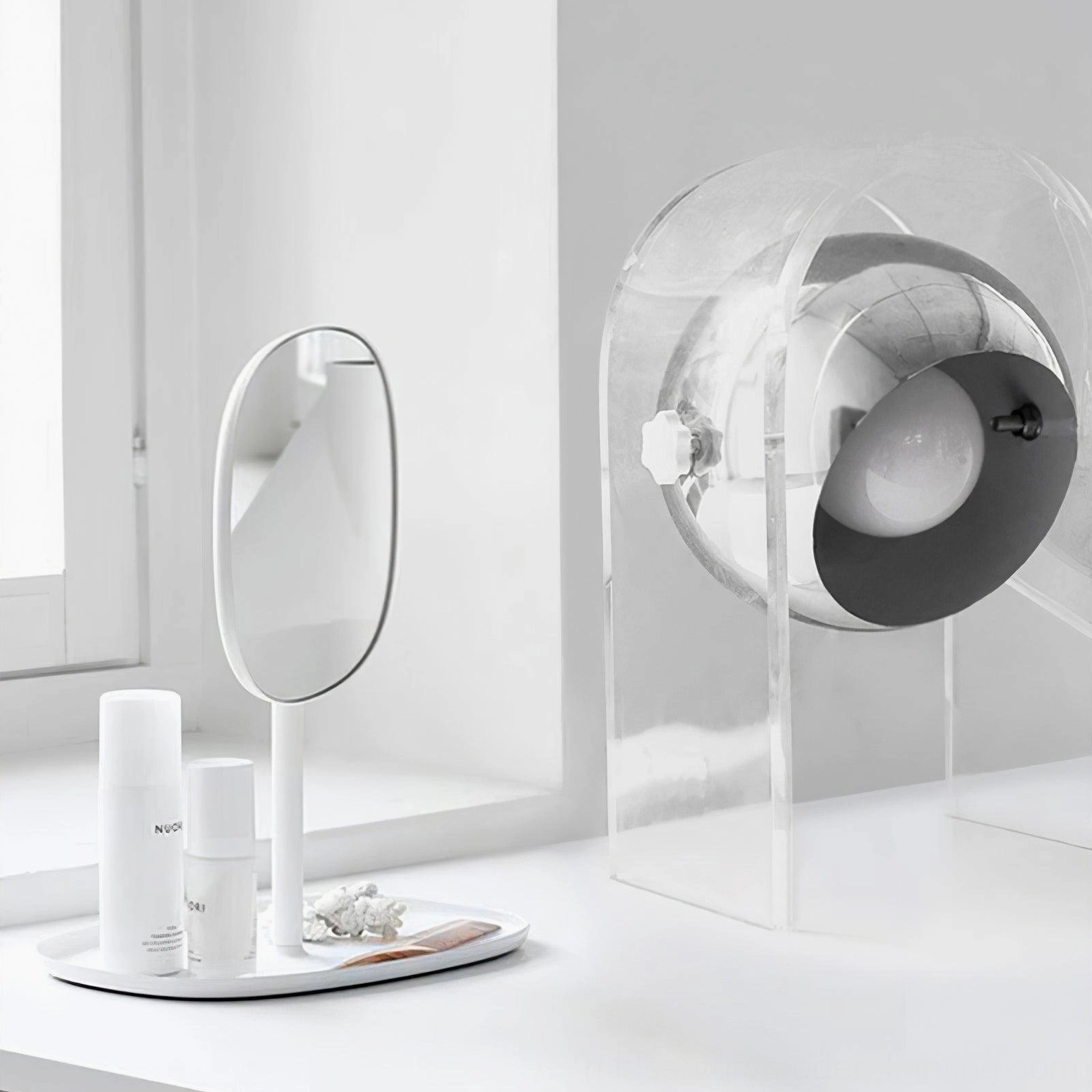 Touch table lamp on vanity table setup with skincare products and mirror accessories