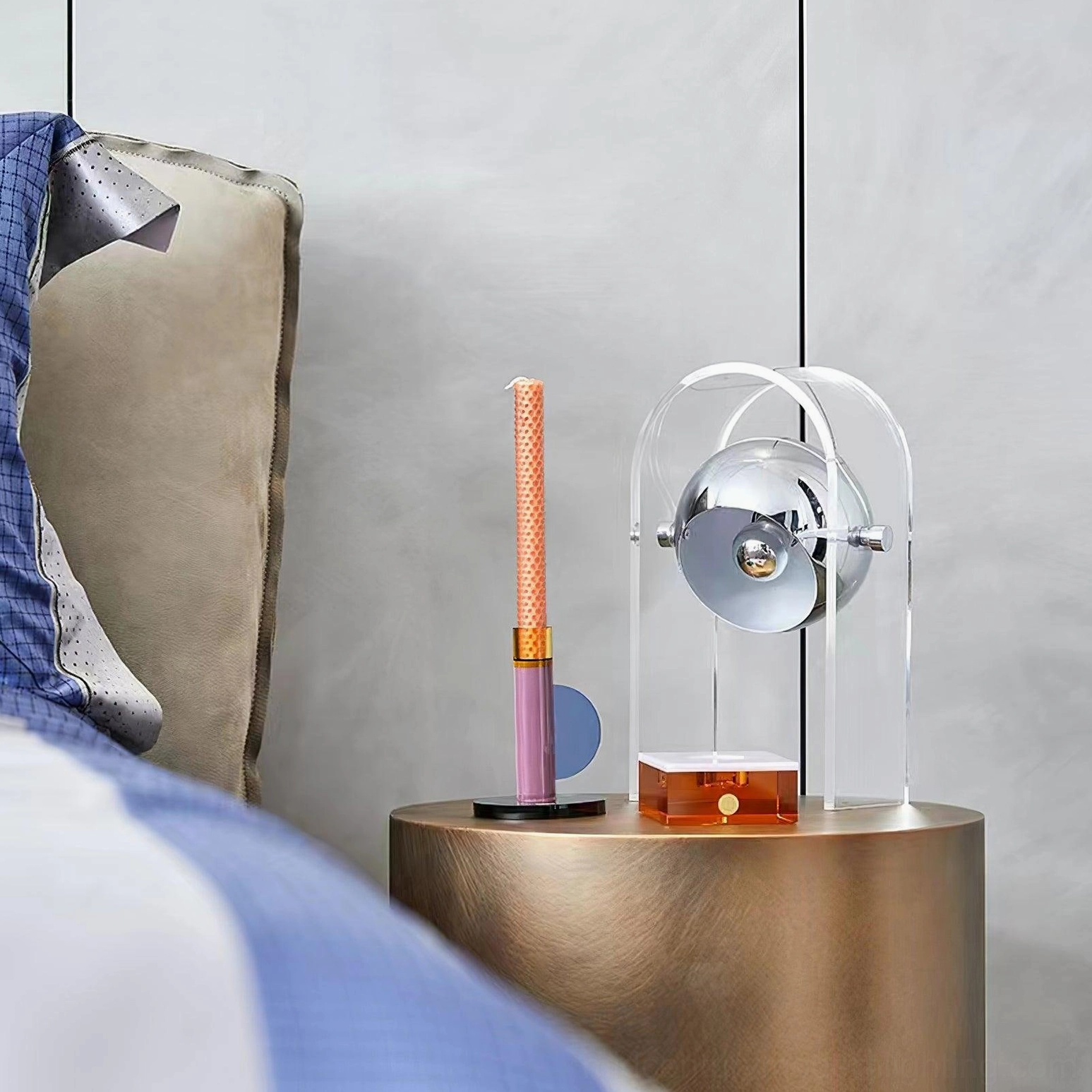 Modern acrylic table lamp in home office workspace with neutral color palette and professional styling