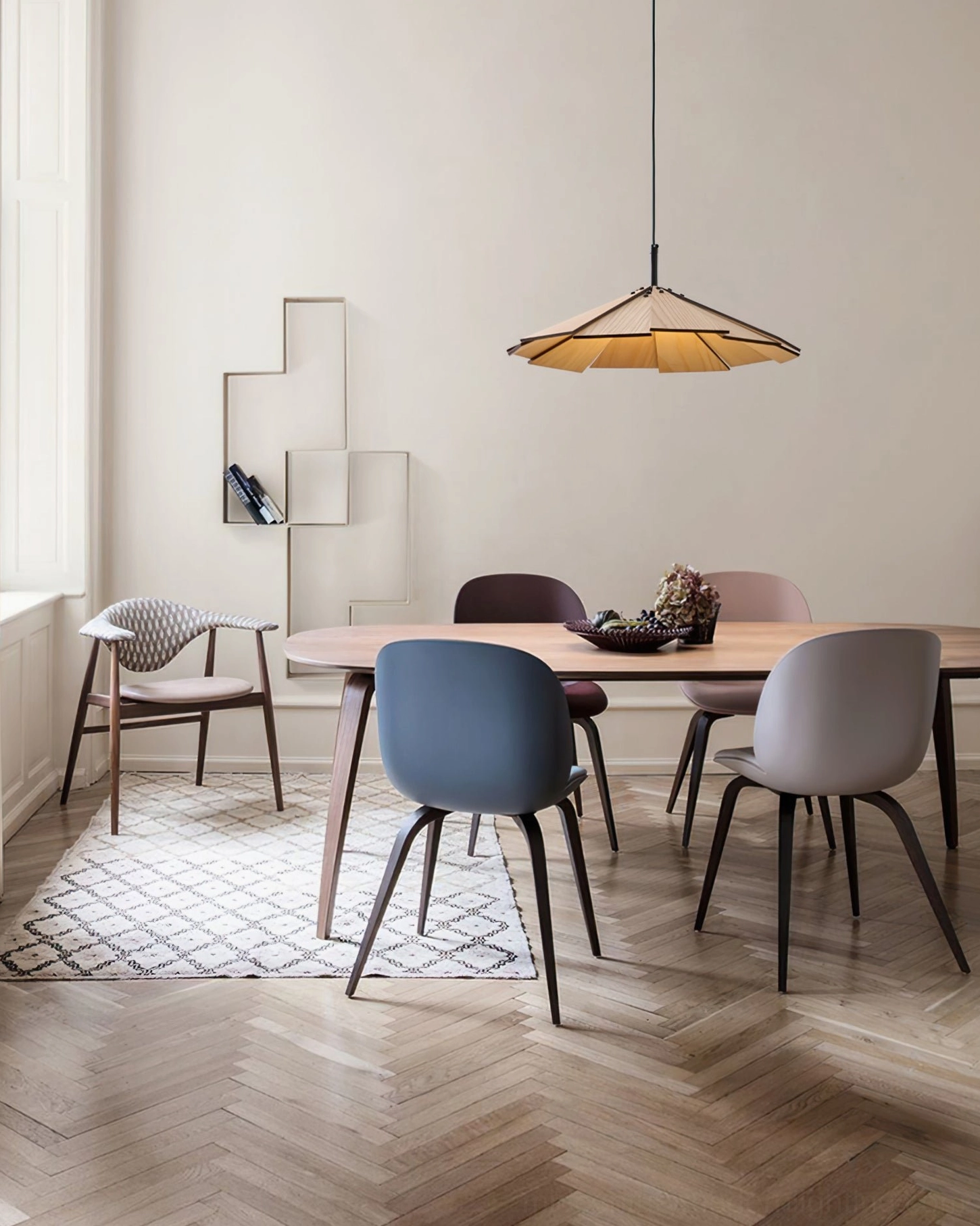 Sepal pendant lamp in contemporary dining room providing warm ambient lighting for family meals