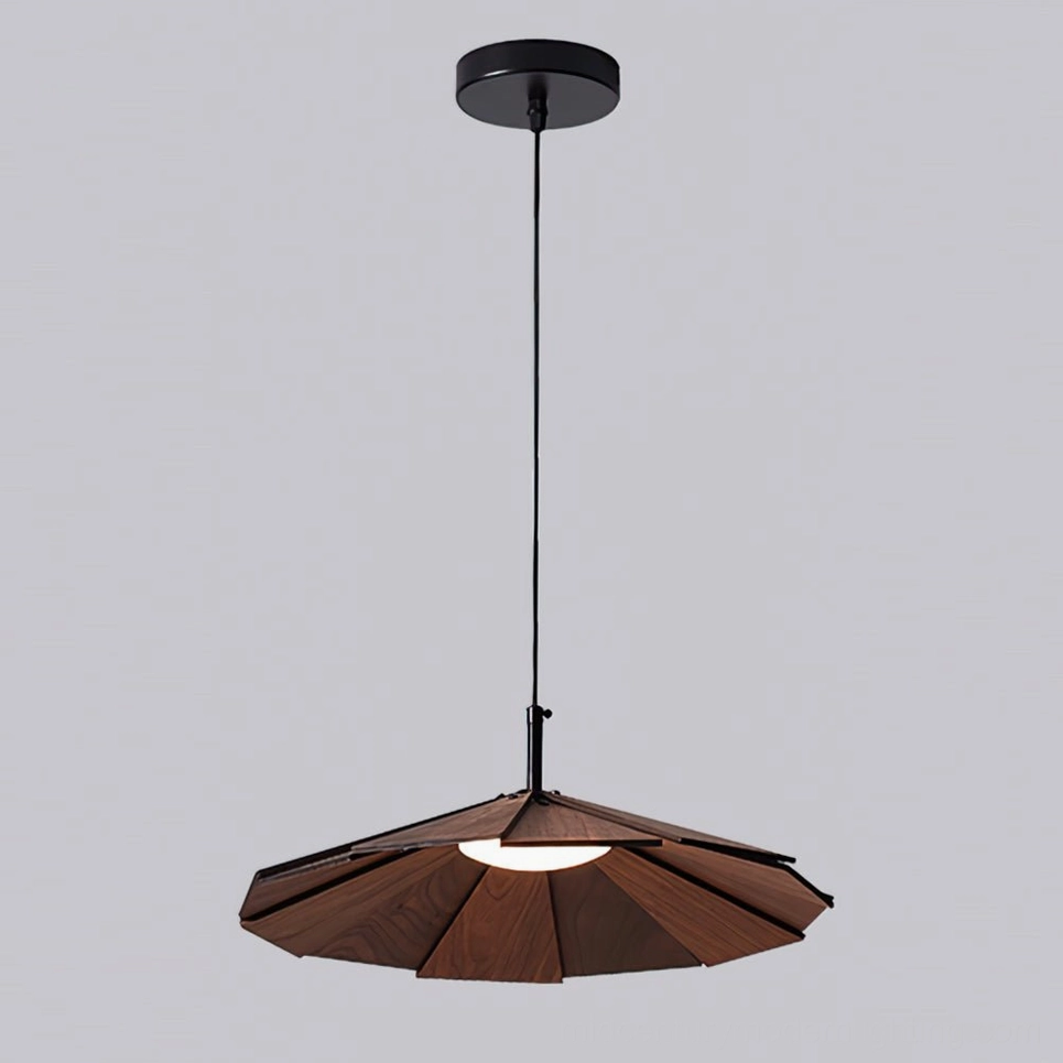 Sepal pendant lamp walnut color variant with warm light creating rich ambiance in dining area