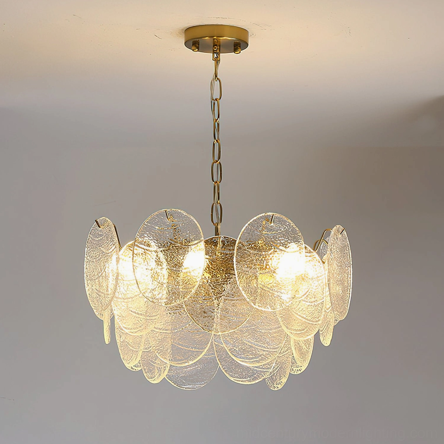 Seraphina Halo Chandelier side profile view glass disc layering brass metalwork craftsmanship detail