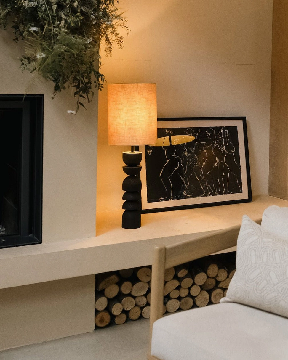 Modern Sergio lamp in contemporary living room with firewood storage and sofa ambiance