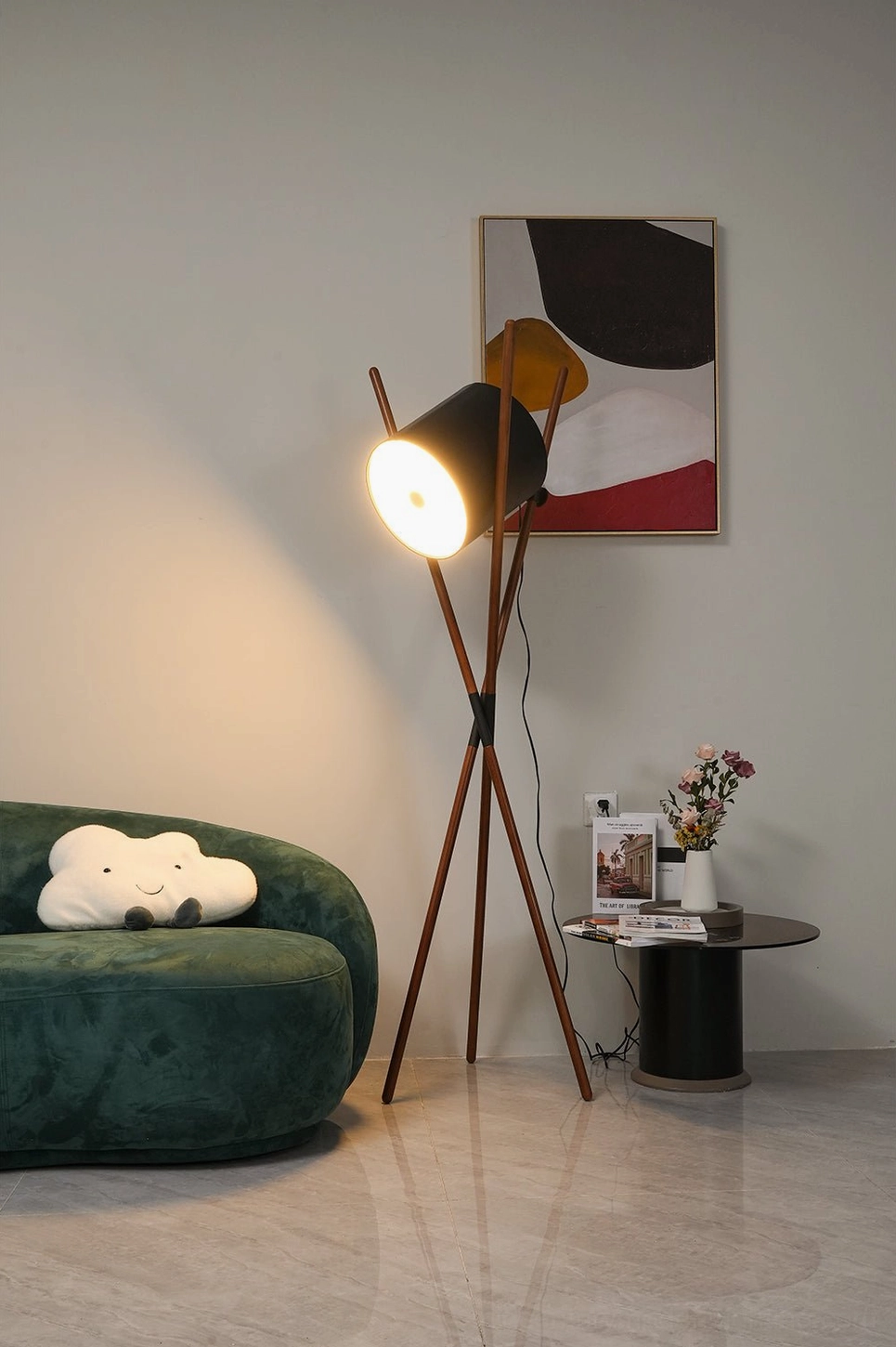 Shift floor lamp glowing with warm light - cylindrical shade casting soft illumination in modern home