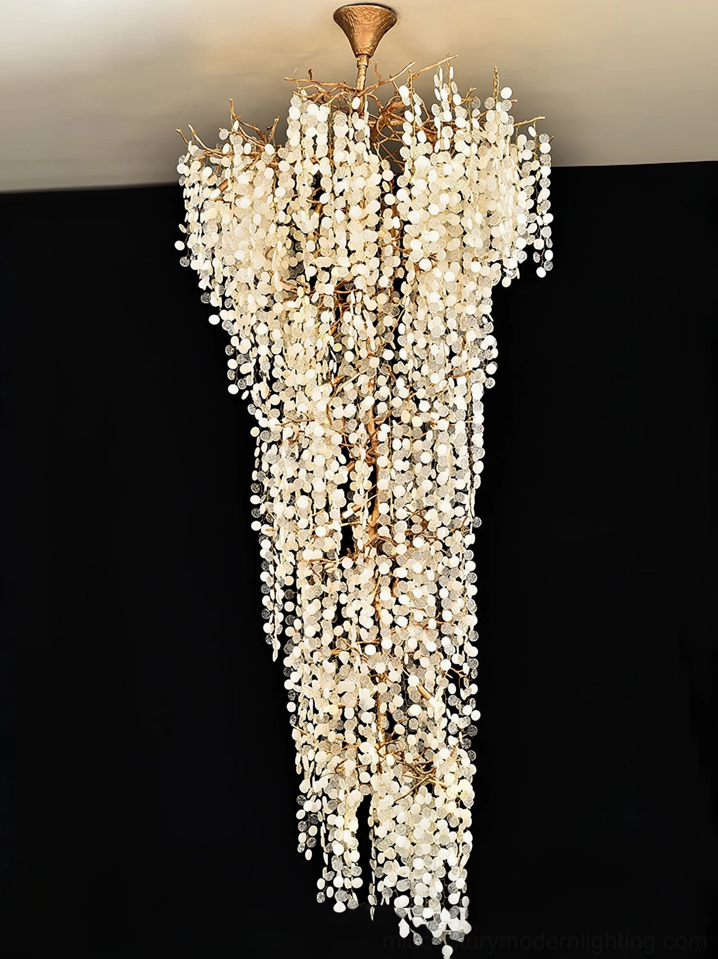 Shiro Noda chandelier detail shot brass frame hand-formed organic branches crystal glass coins close-up