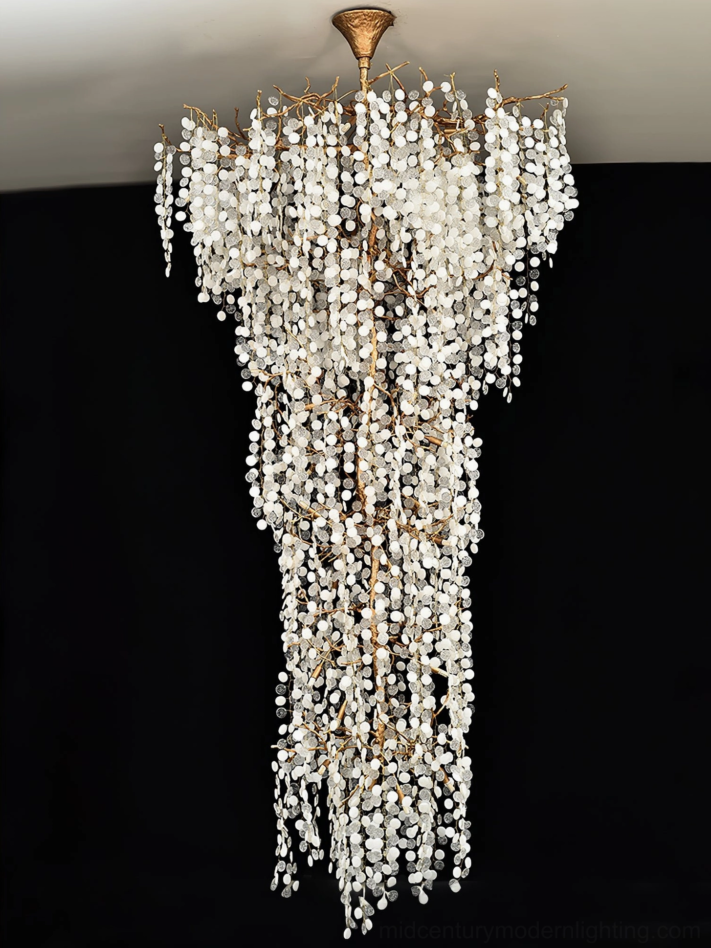 Shiro Noda compact crystal cascading chandelier dark background studio photography showcase