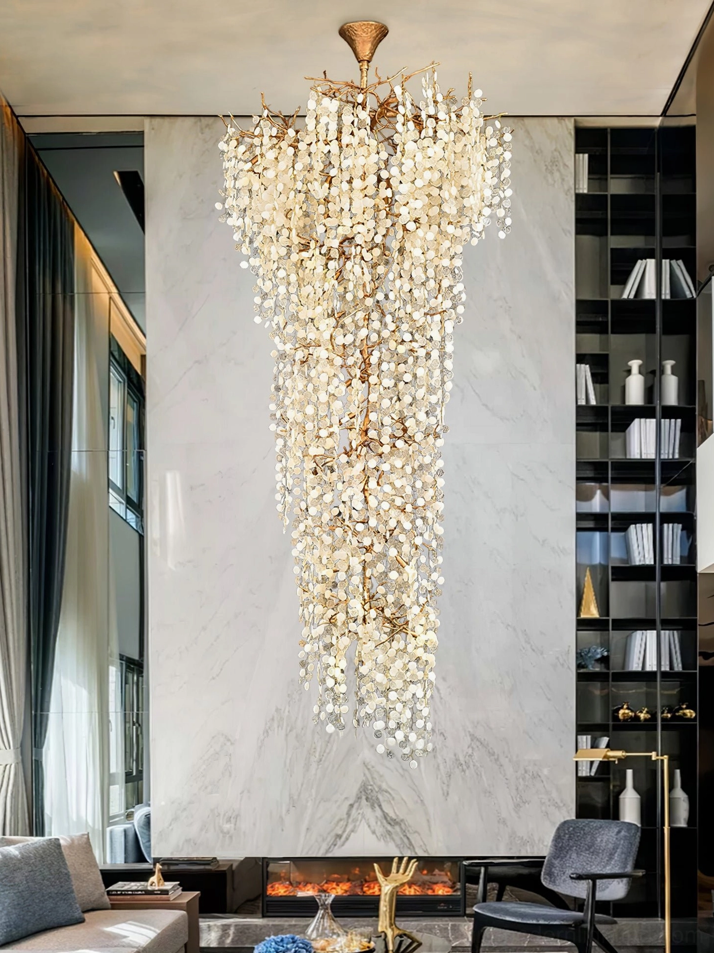 Shiro Noda chandelier lifestyle photo luxury residential grand foyer illuminated brass crystal